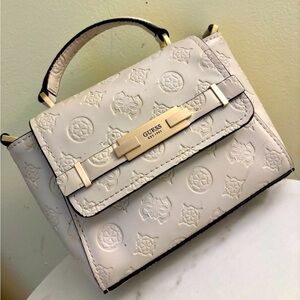 Guess  Embossed Crossbody mini  Bag! 8.5 by 6 inches